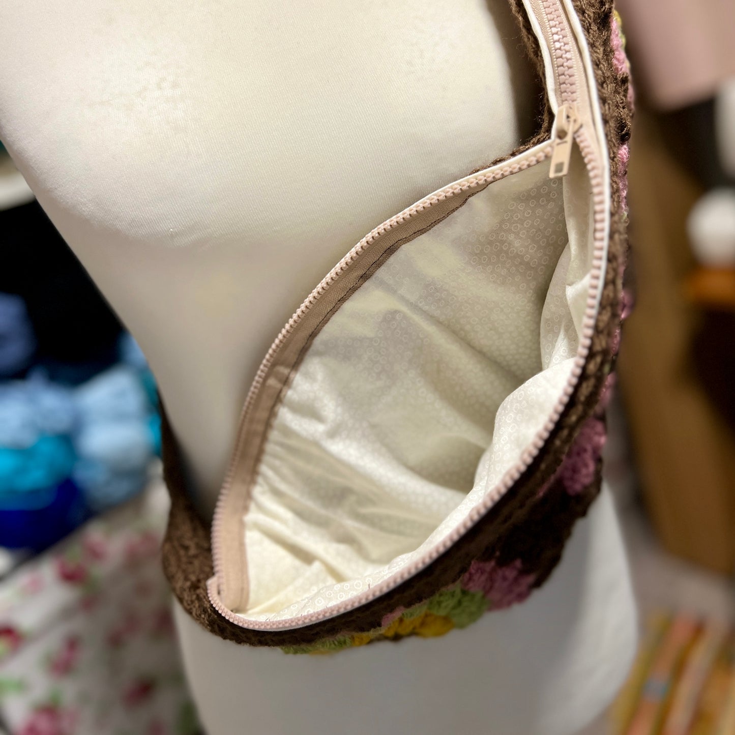 Close-up of a bra on a mannequin with a blurred background